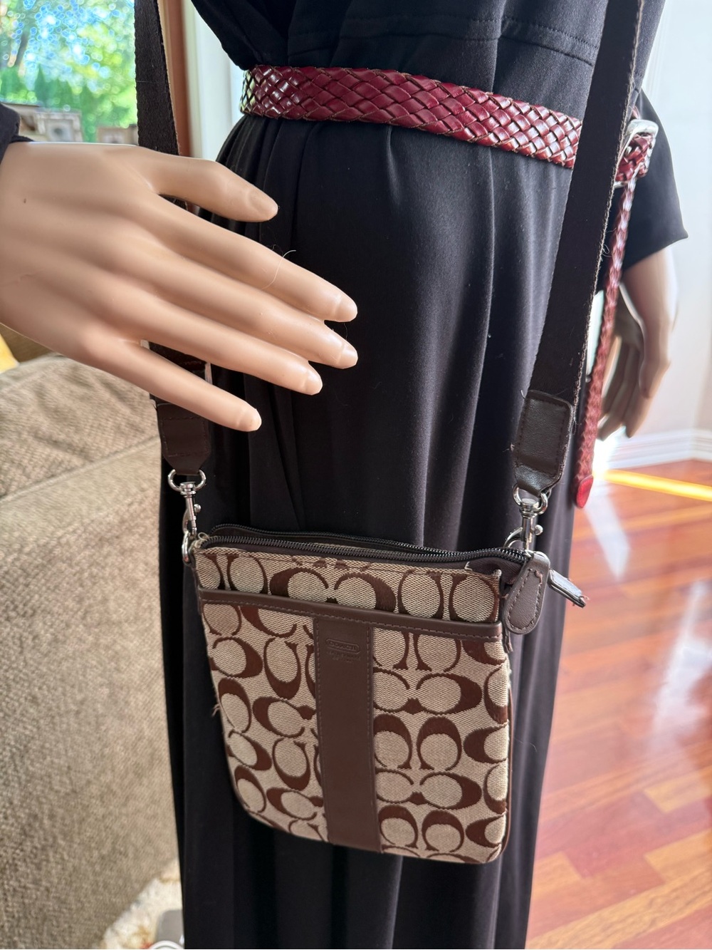 Coach Brown Signature Crossbody Bag with Tan Background